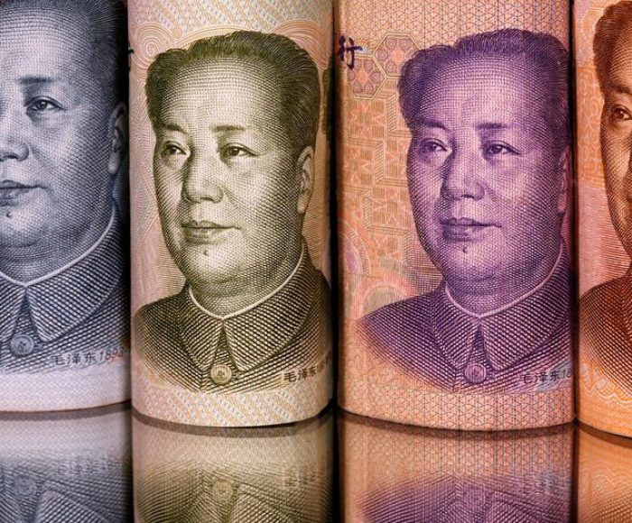 Chinese Yuan banknotes are seen in this illustration