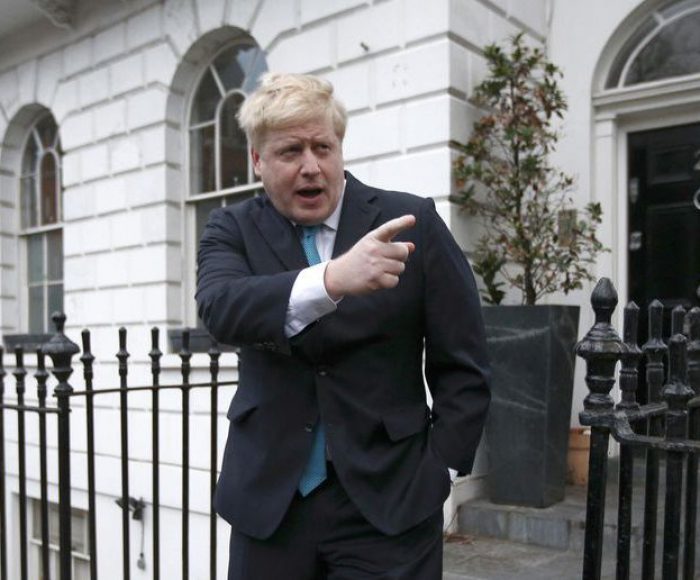London Mayor Boris Johnson prepares to speak to the media in front of his home in London
